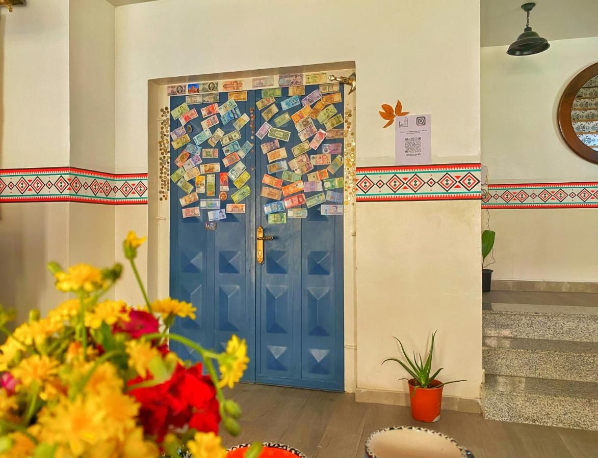 Hand-painted blue door inside The Castle Star