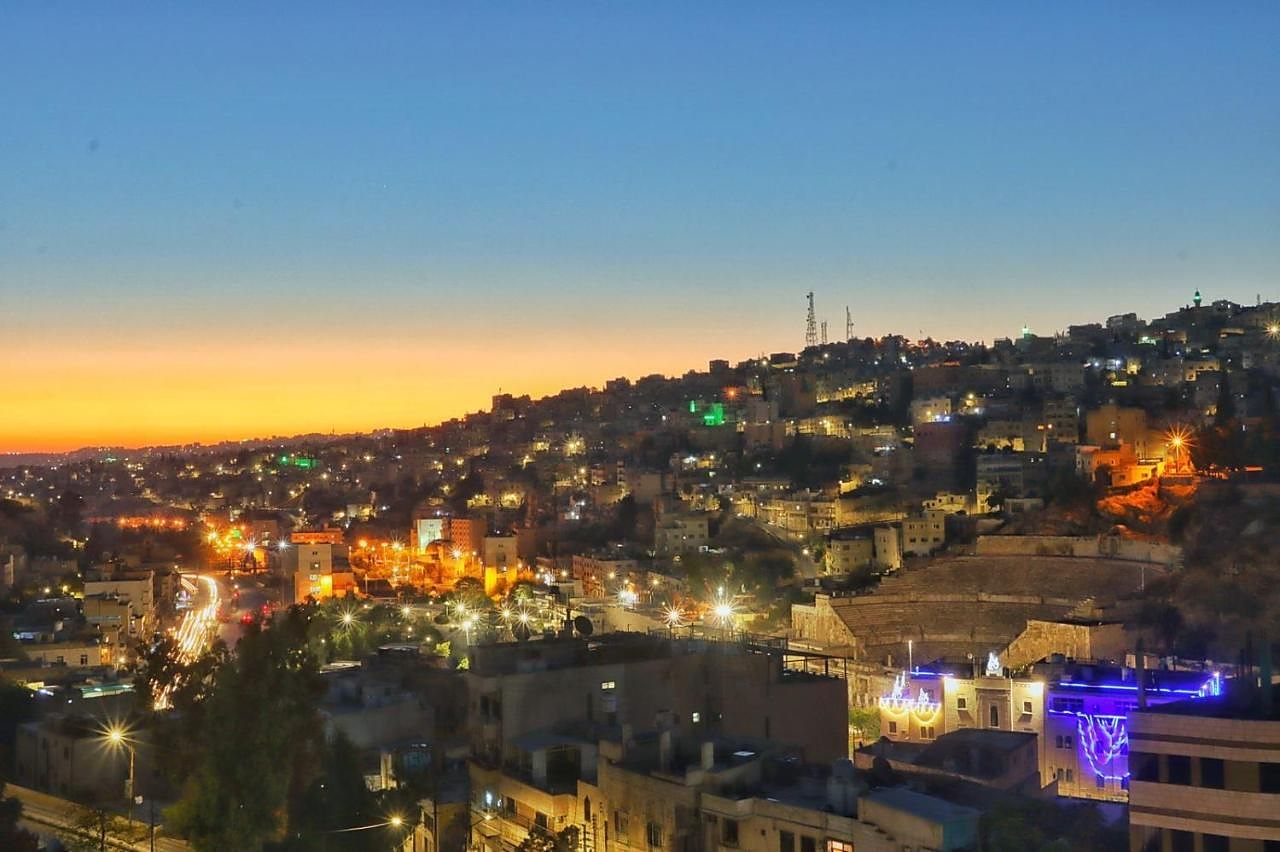 Amman at dusk from The Castle Star, with the Roman Theatre lit up below