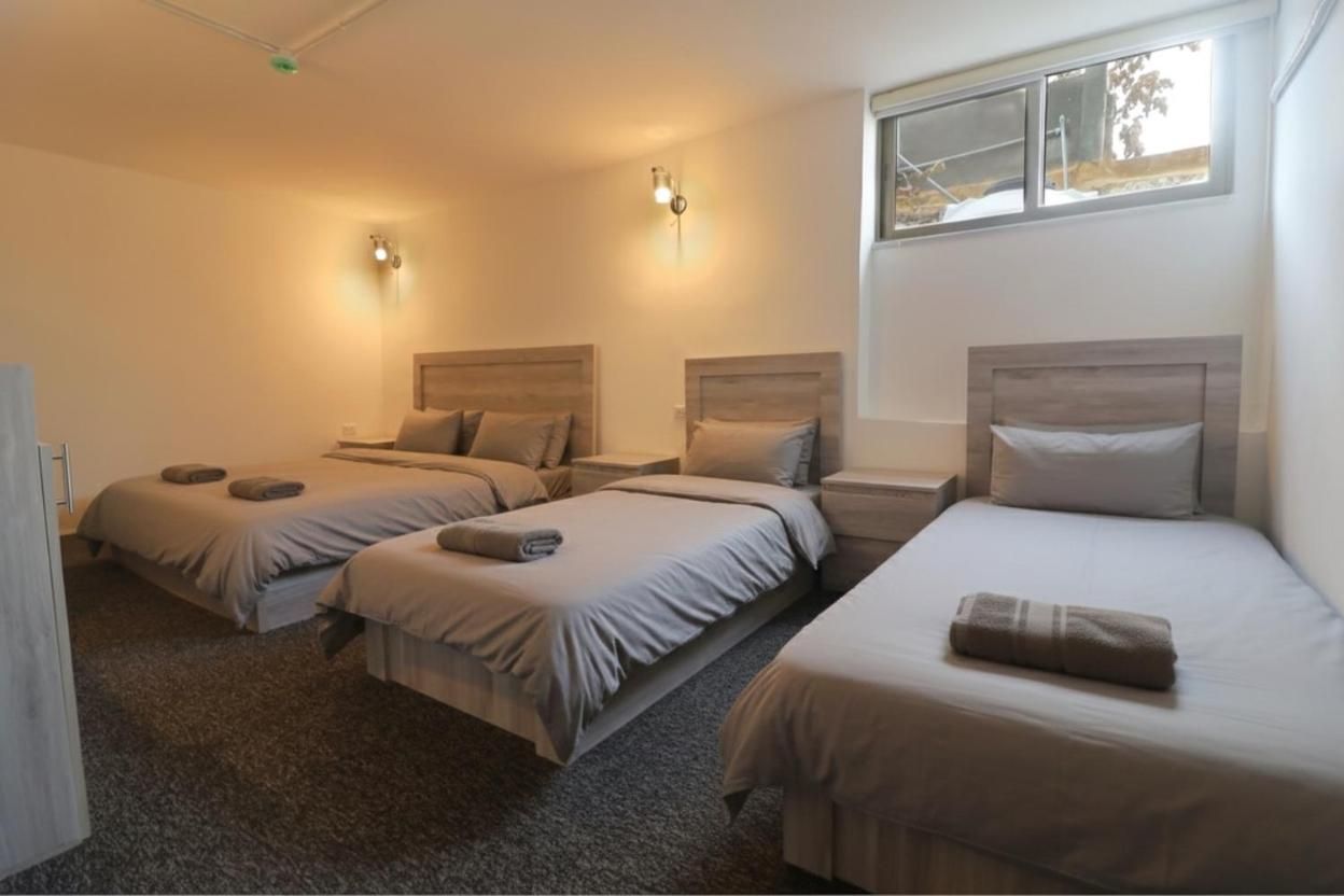 Comfort triple room with three single beds