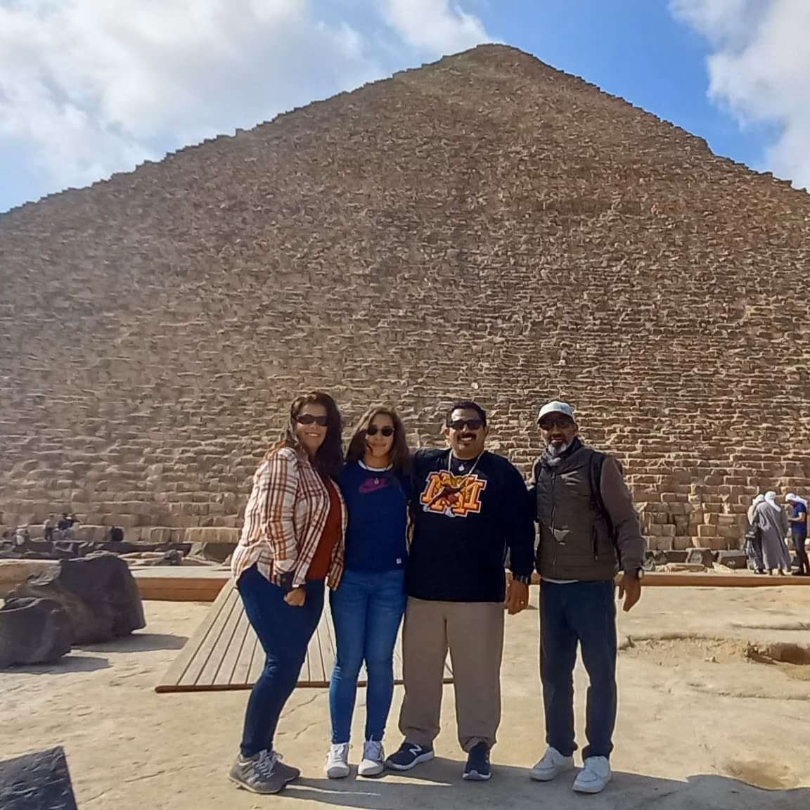 A family at the foot of the Great Pyramid