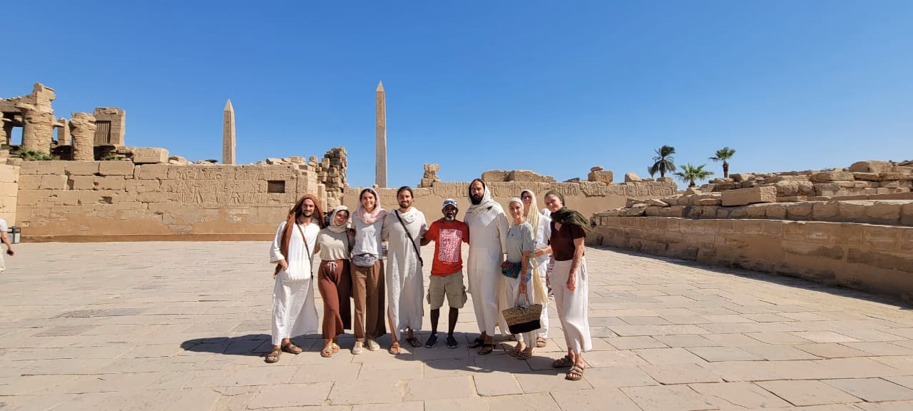 A group in white at Karnak Temple, Luxor