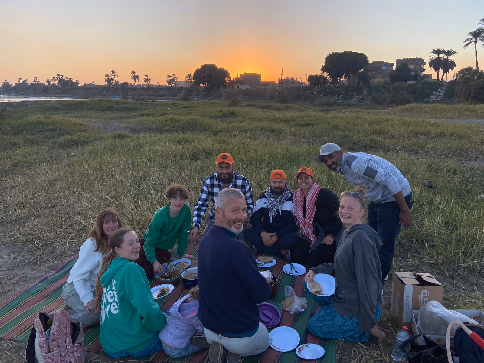 Sunset picnic with the family on the Nile bank