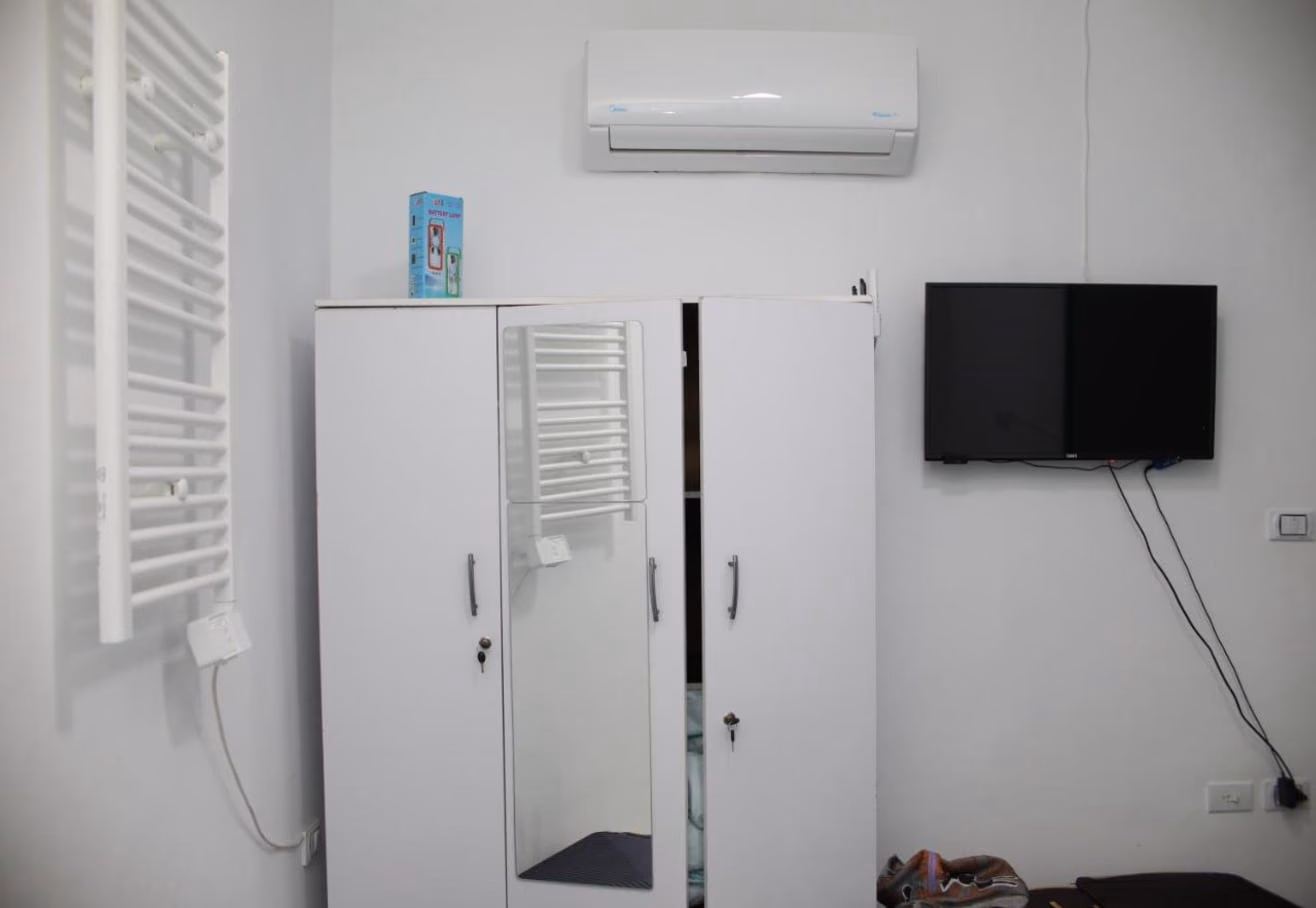 Deluxe Queen Room with towel radiator, wardrobe and TV