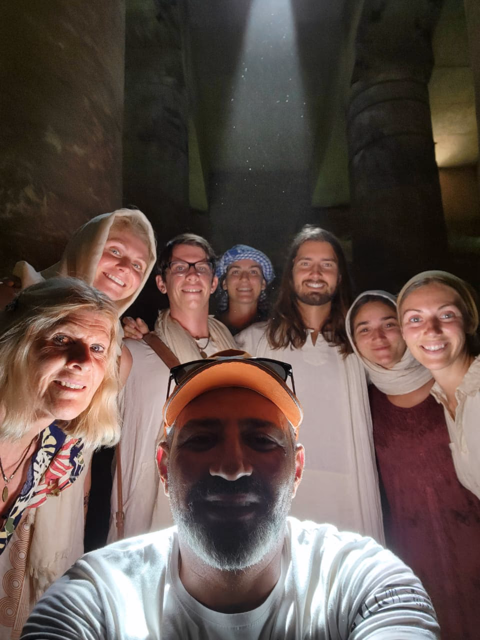 Group selfie inside a temple hall
